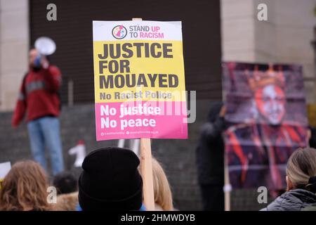 Newport, Gwent, Wales - Saturday 12th February 2022 - Protest in Newport calling for justice for Mouayed Bashir ( banner image on right ) who died after being restrained by Gwent Police at his parents home in Newport one year ago in Feb 2021 - The Independent Office for Police Conduct ( IOPC ) is still investigating the death. Photo Steven May / Alamy Live News Stock Photo