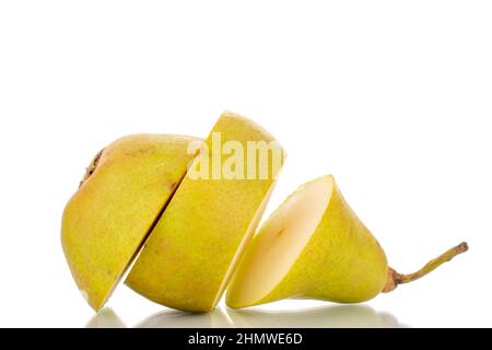 One sweet juicy pear cut into three pieces, macro, isolated on a white background. Stock Photo