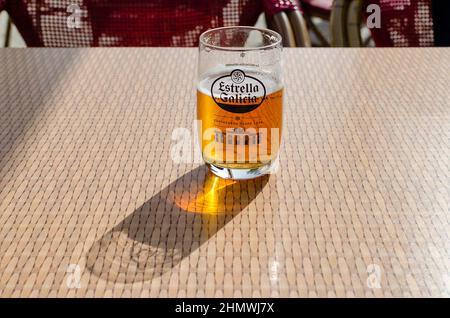 Seville, Spain; February 11, 2022: Selective focus on a glass of beer on a sunny day Stock Photo