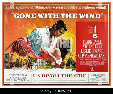 GONE WITH THE WIND Vintage movie poster starring Clark Gable and Vivien Leigh 1930’s Vintage Movie Film Poster  1939, M.G.M., USA by artist Armando Seguso  Gone with the Wind is a 1939 American epic historical romance film adapted from the 1936 novel by Margaret Mitchell. The film was produced by David O. Selznick of Selznick International Pictures and directed by Victor Fleming. The leading roles are played by Vivien Leigh (Scarlett), Clark Gable (Rhett), Leslie Howard (Ashley), and Olivia de Havilland (Melanie). Stock Photo