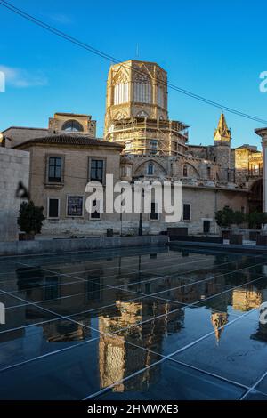 VALENCIA , SPAIN - DECEMBER 8 2021: mirroring historical buildings in Valencia old town Stock Photo