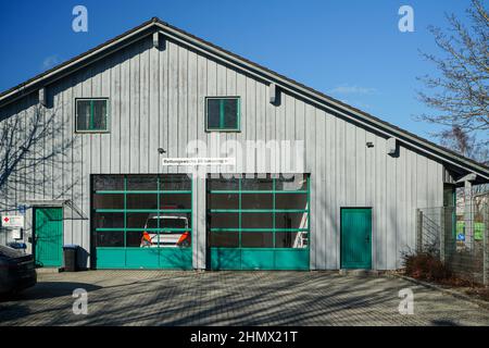 Rescue station of a German city. An ambulance is parked in the garage. Stock Photo