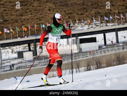 Zhangjiakou, China's Hebei Province. 12th Feb, 2022. Li Xin of China competes during the cross-country skiing women's 4x5 km relay of the Beijing Winter Olympics at National Cross-Country Skiing Centre in Zhangjiakou, north China's Hebei Province, Feb. 12, 2022. Credit: Feng Kaihua/Xinhua/Alamy Live News Stock Photo