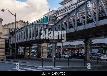 Paris, France - February 11, 2022 : View of an overground metro train passing by, in the center of Paris France Stock Photo