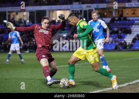 PETERBOROUGH, UK. FEB 12TH. Peterborough UnitedÕs goalkeeper Steven Benda challenges Cameron Archer of Preston North End during the Sky Bet Championship match between Peterborough United and Preston North End at Weston Homes Stadium, Peterborough on Saturday 12th February 2022. (Credit: James Holyoak | MI News) Credit: MI News & Sport /Alamy Live News Stock Photo