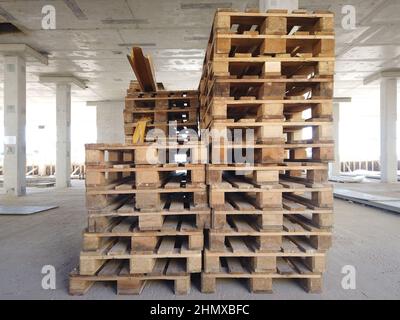 Wooden pallets at construction site Stock Photo