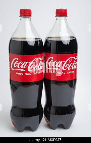 Riga, Latvia February 12.2022:Photo of Coca-Cola plastic bottles Isolated on white Background With clipping path Stock Photo