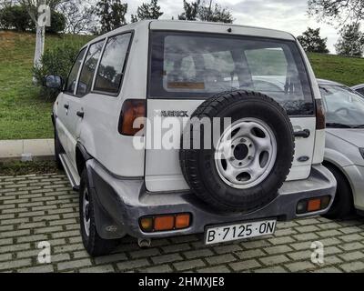 Closeup of a 4x4 Ford Maveric white in the street Stock Photo