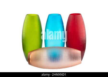 Handmade glass vases. Set of various hand painted glass bottles isolated on white background. Colorful and neat design of the stain glass vase. Stock Photo