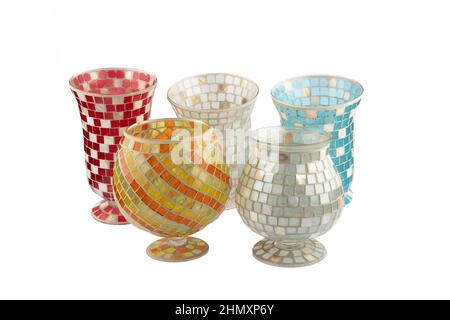 Handmade glass vases. Set of various hand painted glass bottles isolated on white background. Colorful and neat design of the stain glass vase. Stock Photo