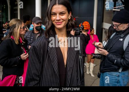 New York, New York, USA. 12th Feb, 2022. ONE model GRACE MCGOVERN, 27 of London, England poses for pictures while waiting in line to attend a show at spring studios in New York Fashion Week in New York at the beginning of Fashion week. McGovern moved to the U.S. last January. (Credit Image: © Brian Branch Price/ZUMA Press Wire) Stock Photo