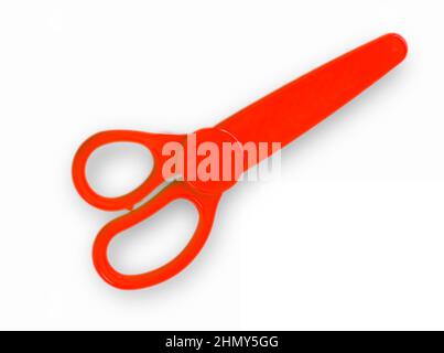 red baby scissors cut out on a white background. View from above Stock Photo