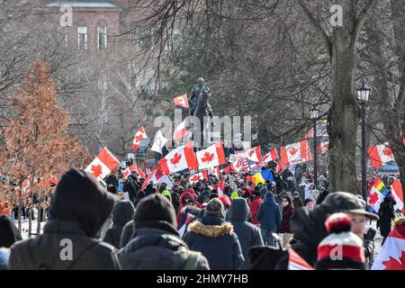 Toronto, Canada. 12th Feb, 2022. Anti-mandate protesters, also known as Freedom Convoy, rally at Ontario's Queen's Park in Toronto to oppose anti-mandates imposed by the government. Crowds gathered around the King Edward VII Equestrian Statue for speeches. Toronto, Ontario, Canada, on February 12, 2022. (Photo by Dominic Chan/Sipa USA) Credit: Sipa USA/Alamy Live News Stock Photo