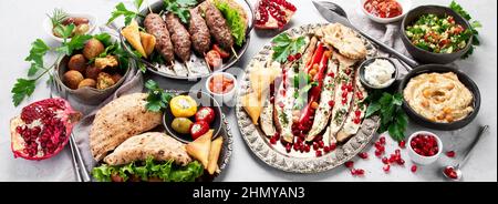 Lebanese food assortment on light background. Traditional food concept. Panorama Stock Photo