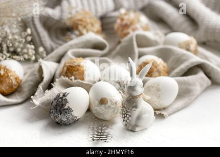 Easter festive background with decorative eggs in pastel colors. Stock Photo