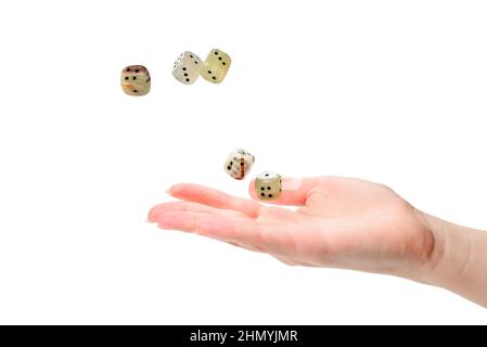Woman throws dices isolated on white. Stock Photo
