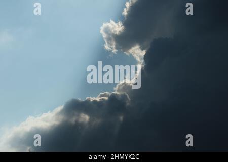 Blue sky and black cloud prior to thunderstorm Stock Photo