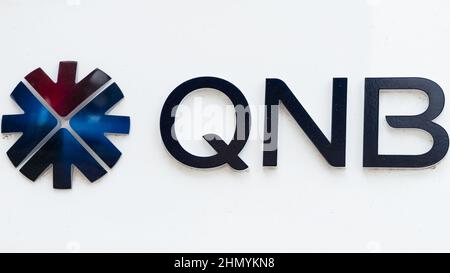 Doha, Qatar - January 16th 2022: Close up of the Qatar National Bank QNB logo Stock Photo