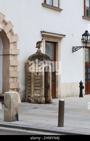 VIENNA, AUSTRIA - MAY 15, 2019: This is an old stone guardhouse at the gate to the courtyard of the Hofburn Palace. Stock Photo