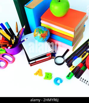 Office and student accessories on a white. Back to school concept. Stock Photo