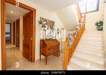 a image of a corridor and staircase inside a villa along the costa del sol Stock Photo