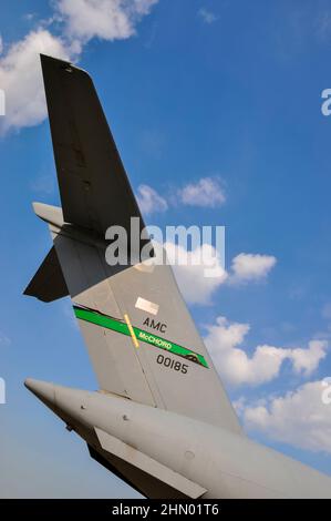US Air Force Boeing C-17A Globemaster III transport plane of Air Mobility Command. Tall tail of Boeing C-17 from McChord air force base. 62 AW Stock Photo