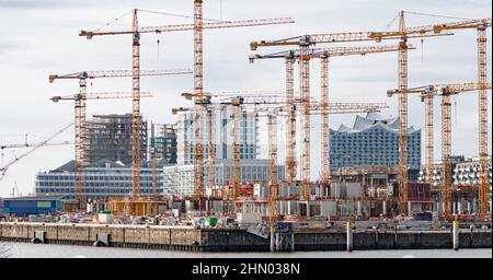 Hamburg, Germany. 12th Feb, 2022. View of the construction sites Überseequartier and Strandkai 56 with the Elbphilharmonie in the background. Credit: Markus Scholz/picture alliance//dpa/Alamy Live News Stock Photo