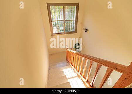 a image looking down a staircase inside a villa along the Costa Del Sol Stock Photo