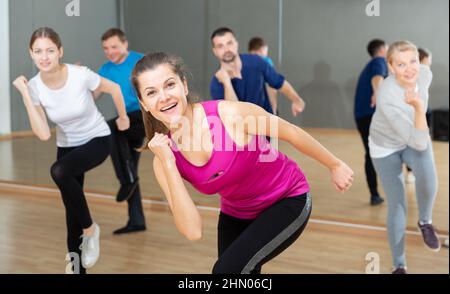 Young woman practicing vigorous dance Stock Photo