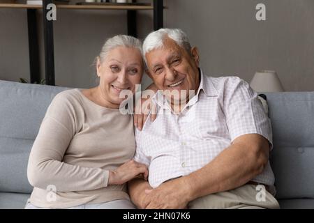 Happy mature old married couple making video call Stock Photo