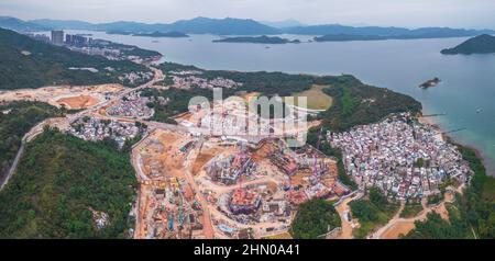Wide angle aerial shot of the Tseng Tau Tsuen Sai Kung and the nearby construction site, residential housing project Stock Photo