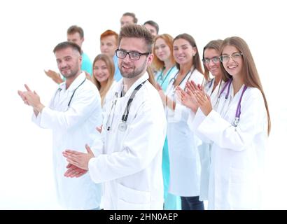 side view. a group of diverse doctors gives a standing ovation Stock Photo