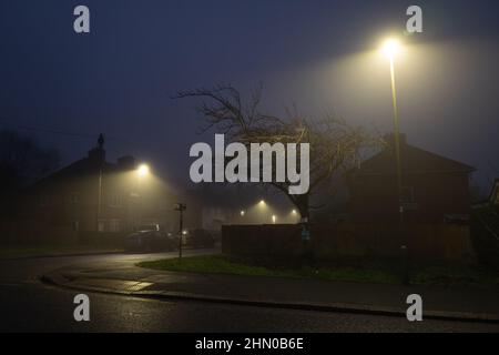 North London residential street in early morning fog, London UK Stock Photo