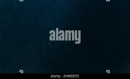 Dark abstract monochrome background with textured effect. Stock Photo