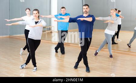 People practicing vigorous dance Stock Photo
