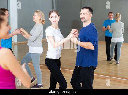 People practicing bachata movements Stock Photo