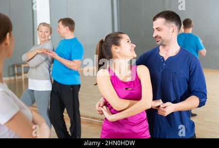 People practicing bachata movements Stock Photo