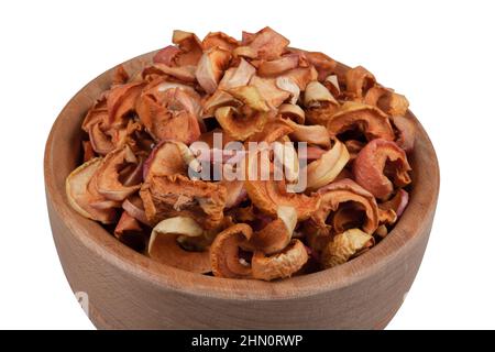 Wooden bowl full of dried apple slices,white background Stock Photo