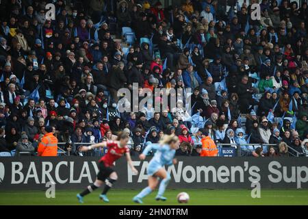 Manchester, UK. 13th Feb, 2022. A general view of fans in the stands during the The FA Women's Super League match at the Academy Stadium, Manchester. Picture credit should read: Isaac Parkin/Sportimage Credit: Sportimage/Alamy Live News Stock Photo