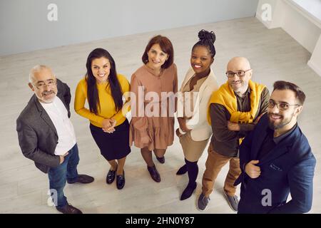 Portrait of diverse multiethnic businesspeople pose in office Stock Photo