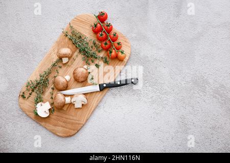Spices and vegetables on light grey table background, top view. Stock Photo
