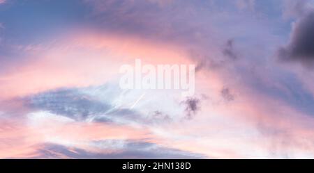 Panorama sky. Clouds painted in sunset watercolor colors. Stock Photo