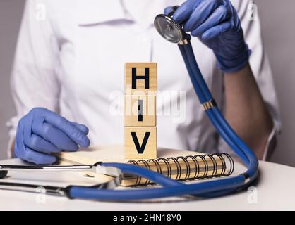 HIV acronym, word in doctor hands. photo Stock Photo