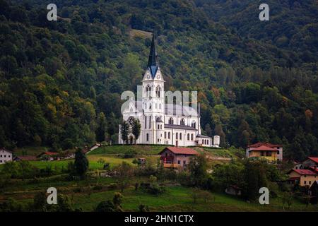 San Fermin Church in the mountain village of Drežnica, beautiful panoramic view, Slovenia Stock Photo