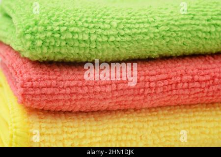 Multi-colored soft terry towels as a background. Stock Photo