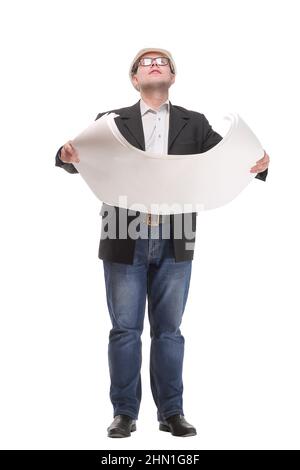 Full length portrait of serious businessman in white hardhat with blueprint looking up Stock Photo