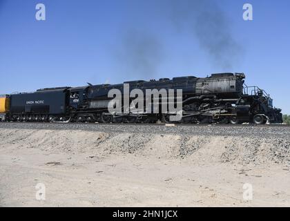 Union Pacific Big Boy 4014 starts moving in Niland, California, which is close to the Salton Sea. Stock Photo