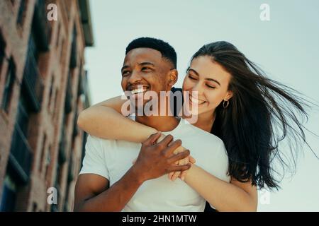 Romantic couple showing affection in the city Stock Photo