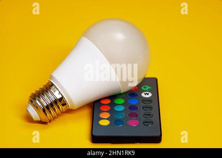 Infrared remote control for control of LED-lamp with color changing. Stock Photo