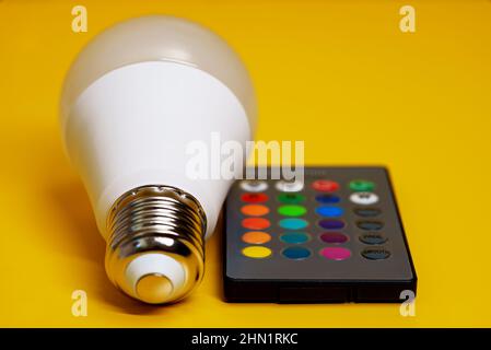 Infrared remote control for control of LED-lamp with color changing. Stock Photo